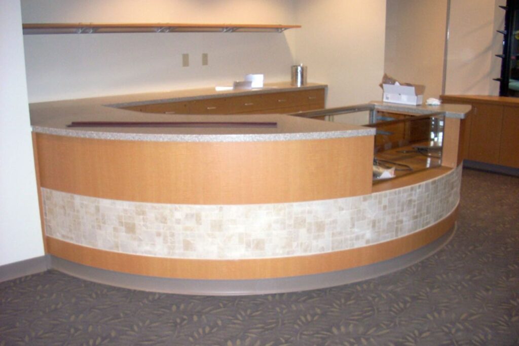 Curved reception desk for Aurora Medical Center.