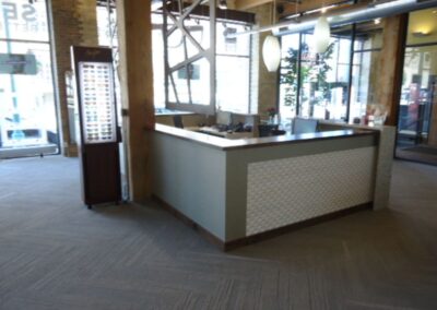 Plastic laminate desk with Soelburg panels for Metro Eye.